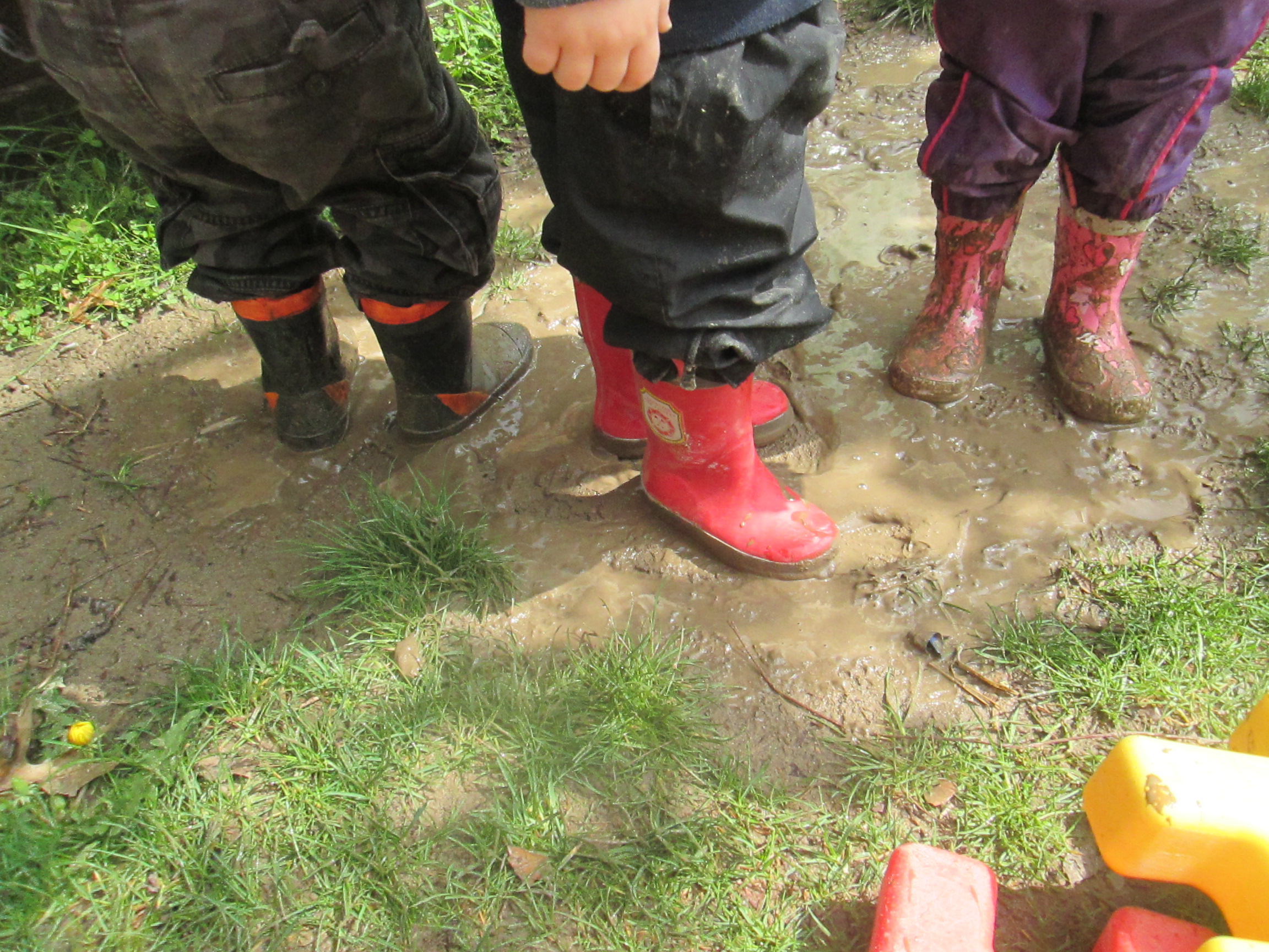 kids boots in the mud